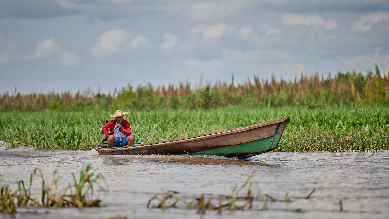 A boat cruises along the Javari River at Atalaia do Norte in Brazil’s Amazon region March 25, 2019. Franciscan Father Joao Messias Sousa, who works among indigenous in the Amazon, said the people believe “God is in all things, but those things are not gods.”
